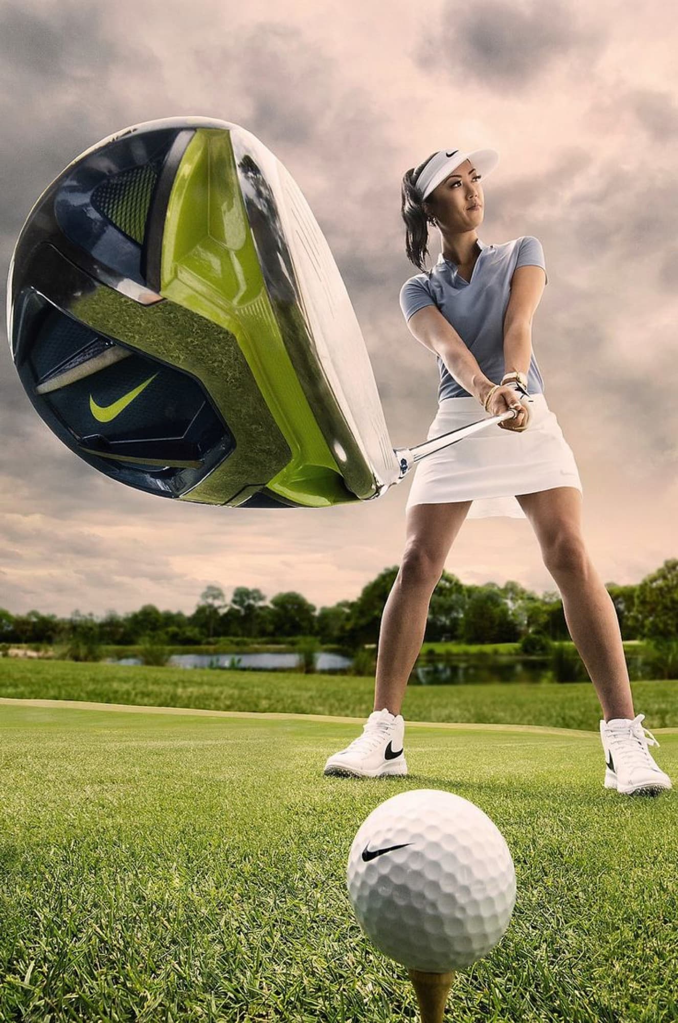 A golfer swinging a driver towards the camera